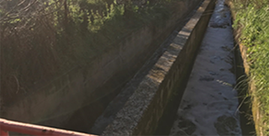 Channel constructed to divert water from two contaminated streams to a point of the Llobregat river downstream of the waterworks located in Sant Joan Despí, near Barcelona.